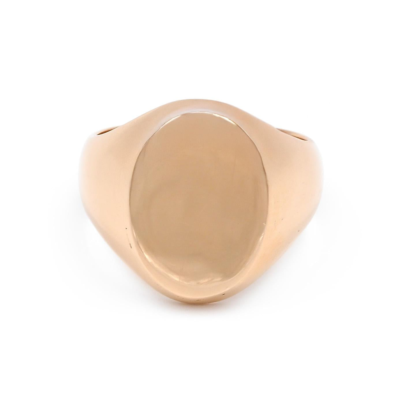 Authentic vintage oval signet ring in polished yellow gold, classic domed face